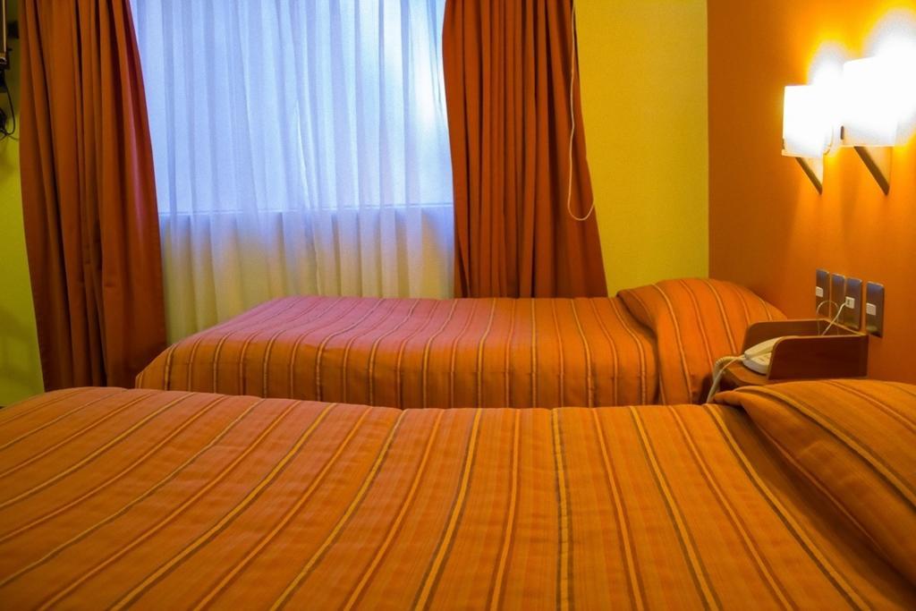 Mosoq Inn Puno Ruang foto