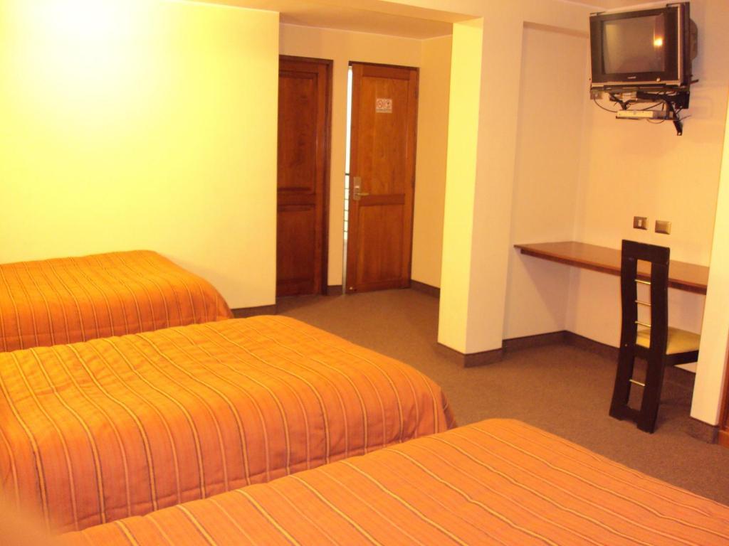 Mosoq Inn Puno Ruang foto