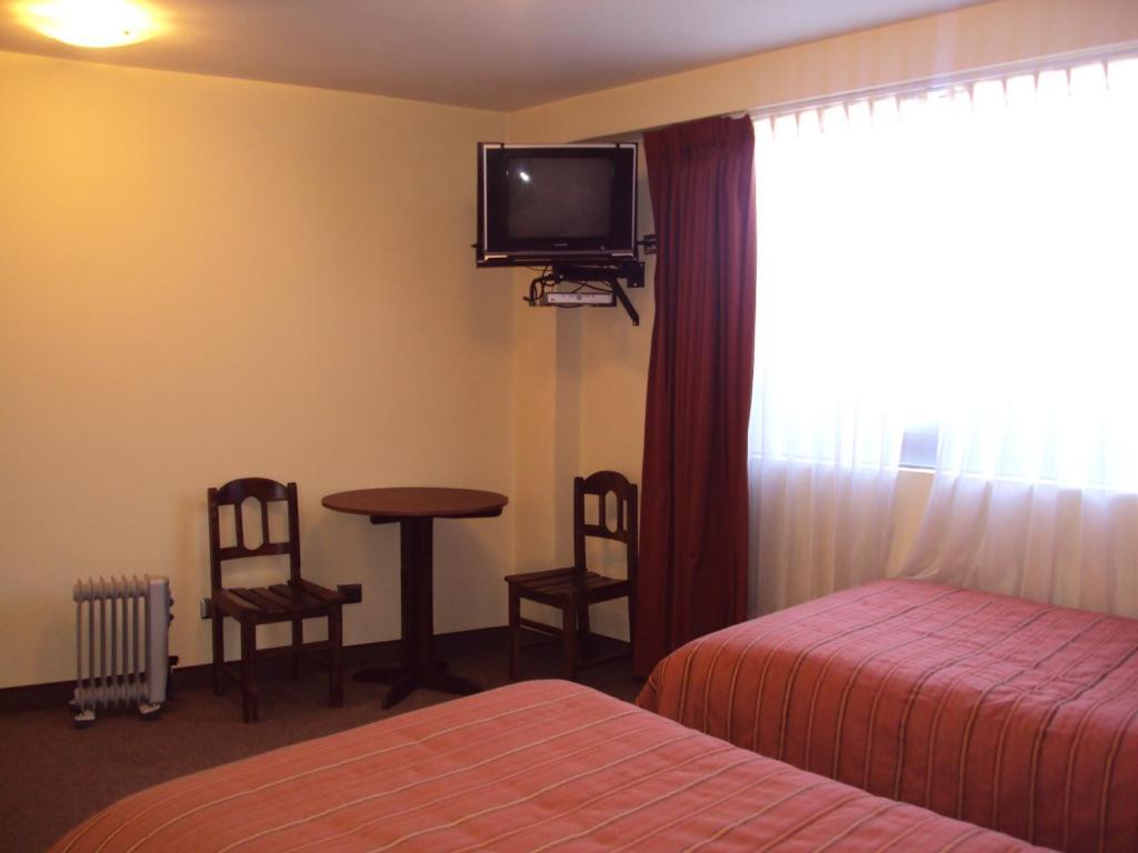 Mosoq Inn Puno Ruang foto